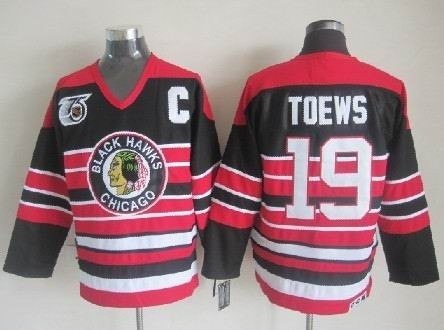 Men's Chicago Blackhawks #19 Jonathan Toews Black Pinstripe 75TH Throwback CCM Jersey